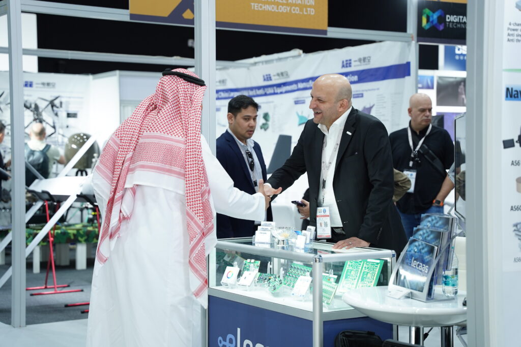 Elecaas Booth at IDEX 2025 Chairman and CEO Basel Abudaqa meeting participants