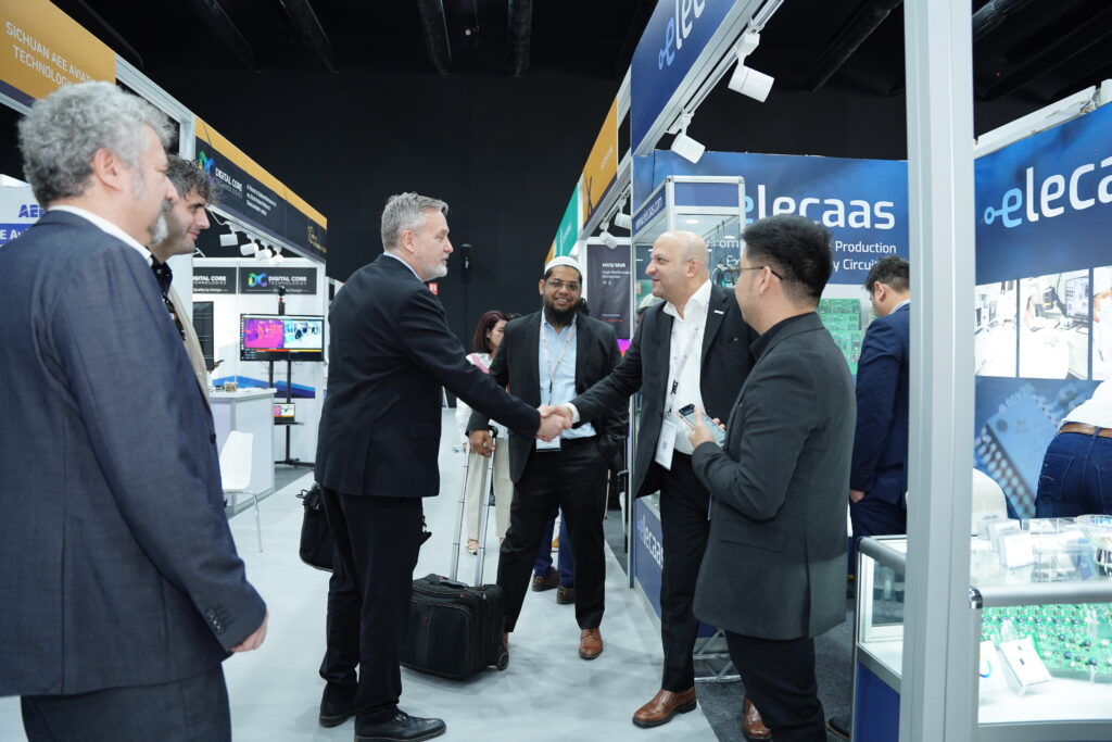 Elecaas Booth Day 3 IDEX 2025 with Chairman and CEO Basel Abudaqa meeting visitor